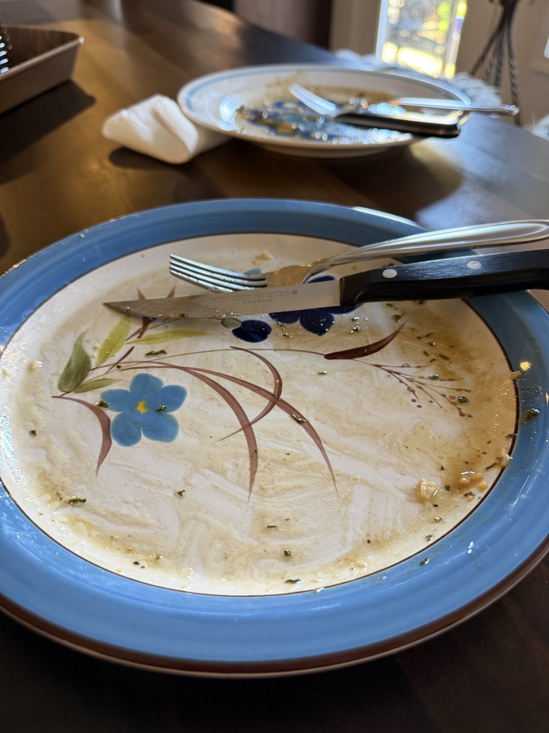 Empty plate after chicken piccata, nothing left