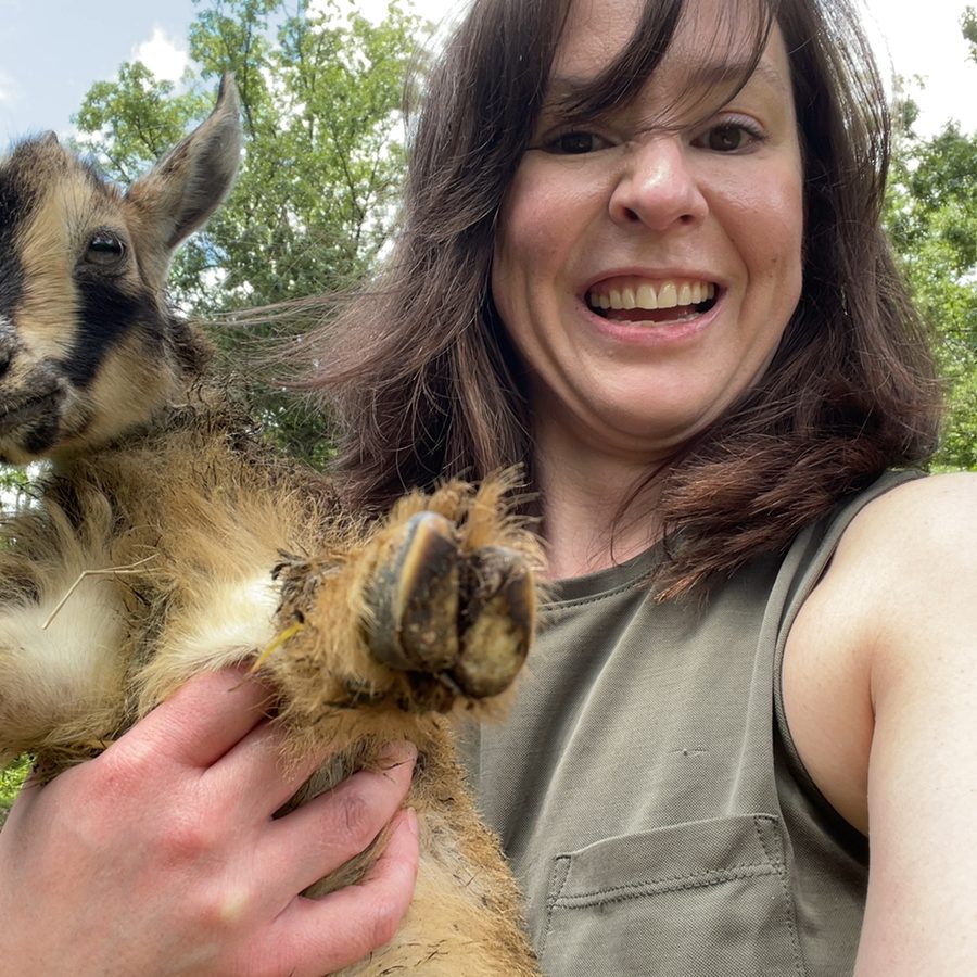 Lorianne with a goat
