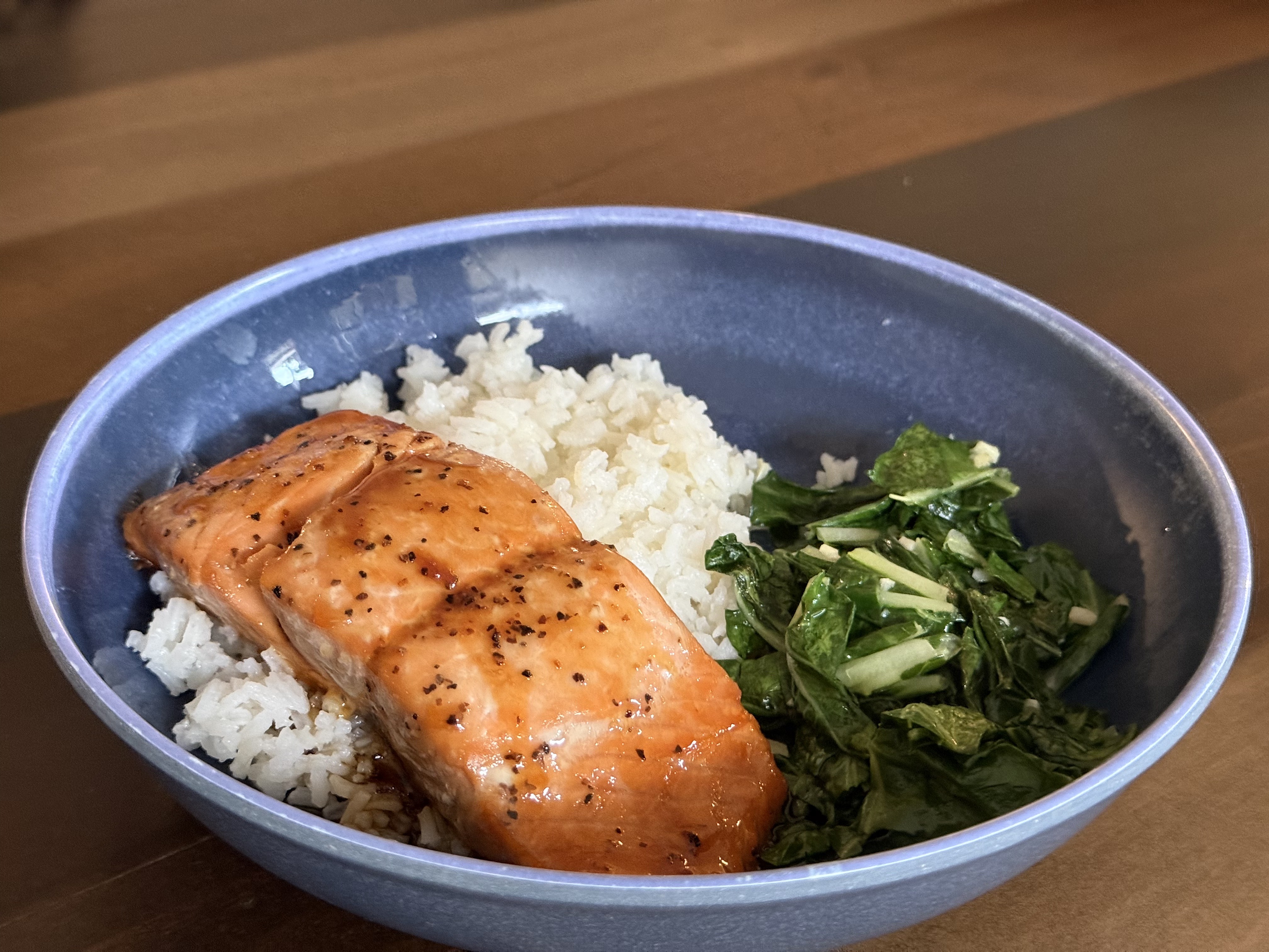 Teriyaki glazed salmon over sesame rice with bok choy